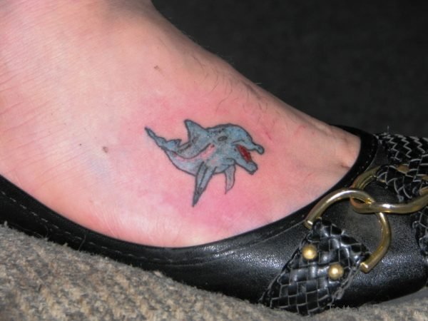 Lovely Dolphin Tattoo On Foot