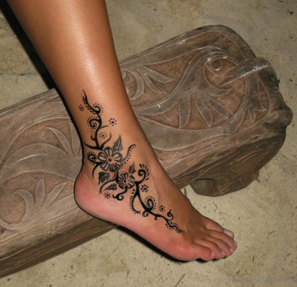 Lovely Drawing Tattoo On Ankle
