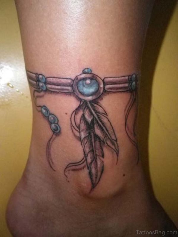 Lovely Feather And Bracelet Tattoo On Ankle