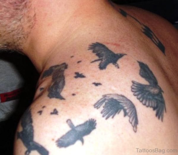 Lovely Flying Birds Tattoo On Left Shoulder