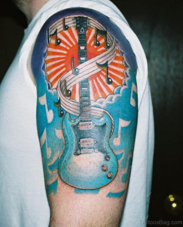 Lovely Guitar Tattoo On Shoulder
