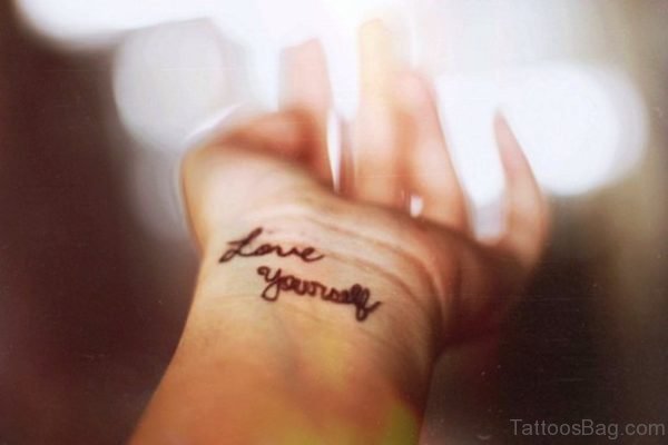 Lovely Love Yourself Tattoo On Wrist 