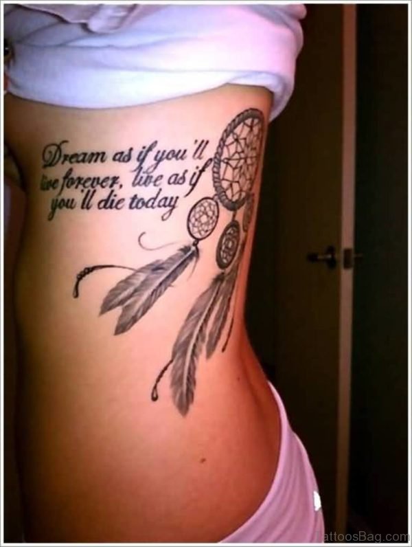 Lovely Wording And Great Dream Catcher Feather Tattoo On Rib Side