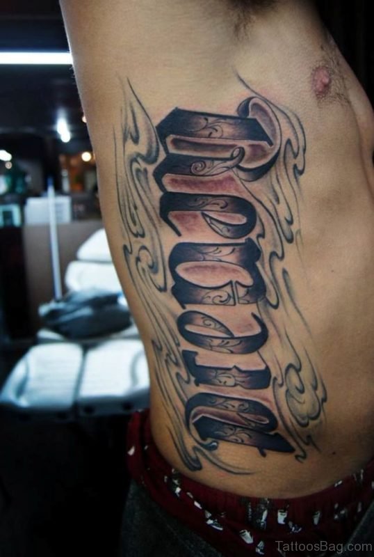 Magnificent Ambigram Tattoo On Rib