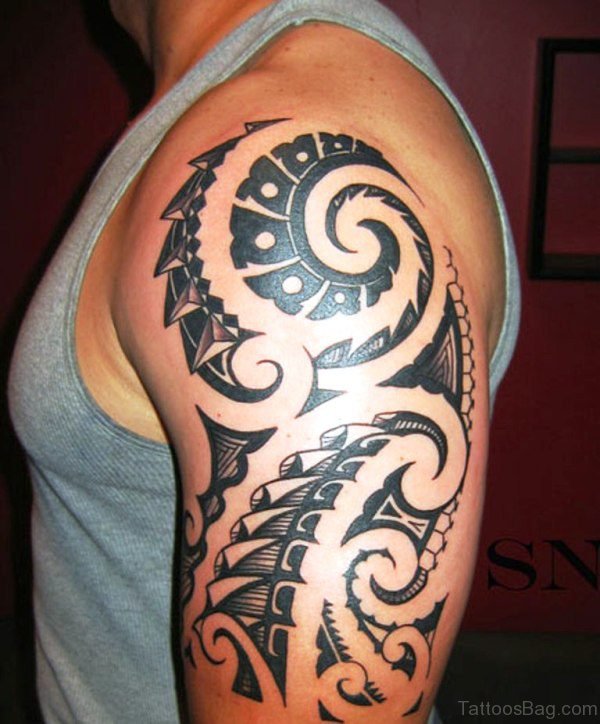 Maori Black Tattoo On Left Shoulder 