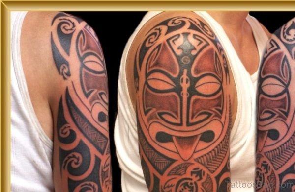 Maori Mask Tattoo On Shoulder