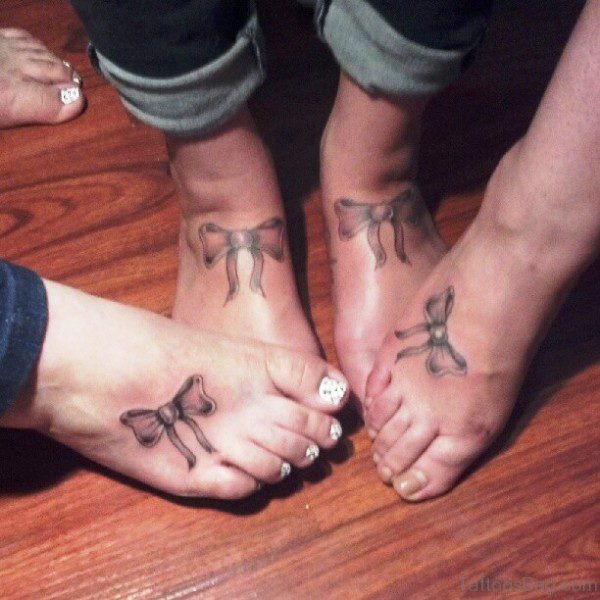 Matching Bow Tattoos On Feet