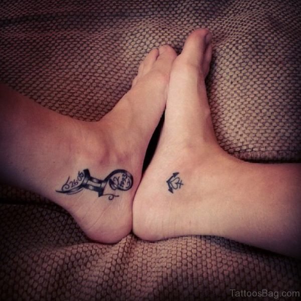 Memorial Gemini And Anchor Tattoo On Ankle