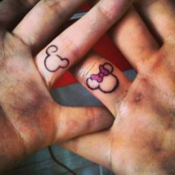 Minnie Mickey Tattoo On Fingers