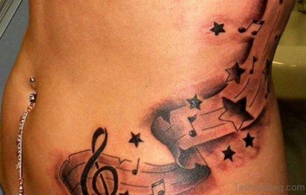 Music And Stars Tattoo On Rib