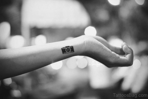 Ncie Camera Wrist Tattoo