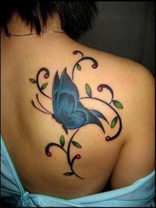 Nice Blue Butterfly Shoulder Tattoo For Women