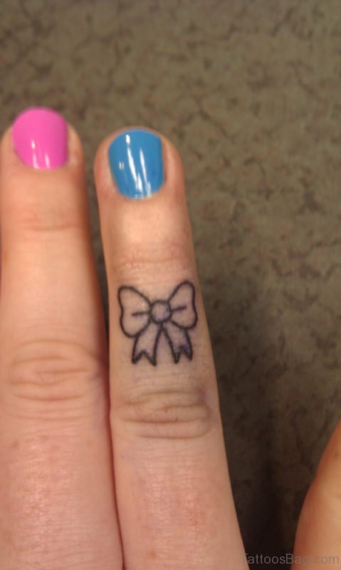 Nice Bow Tattoo On Finger