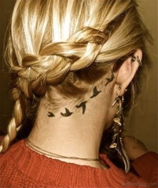 Nice Flying Neck Tattoo Behind Ear