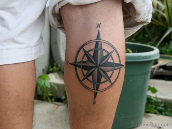 Nice Grey Ink Nautical Compass Tattoo On Back Leg
