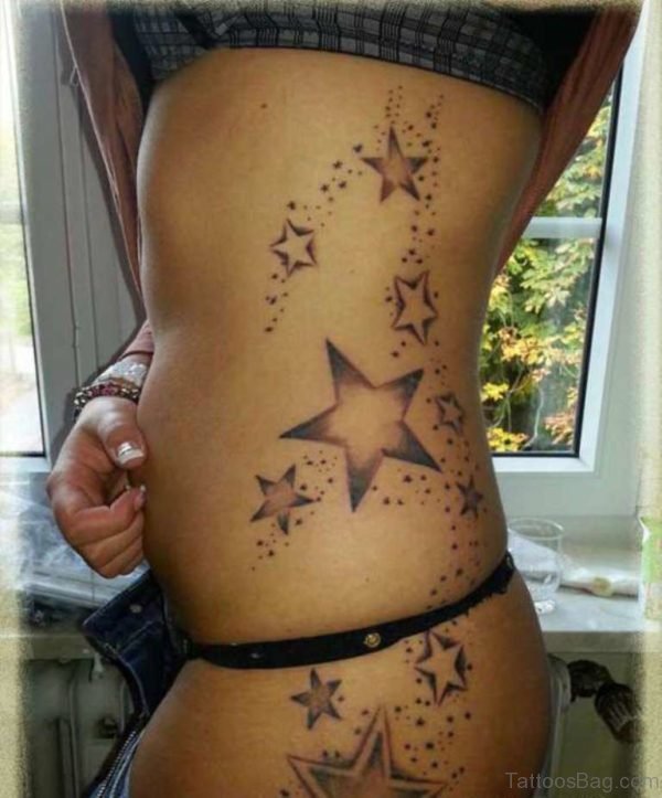 Nice Nautical Stars Tattoo On Rib