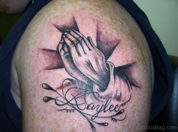 Nice Praying Hands Tattoo On Shoulder