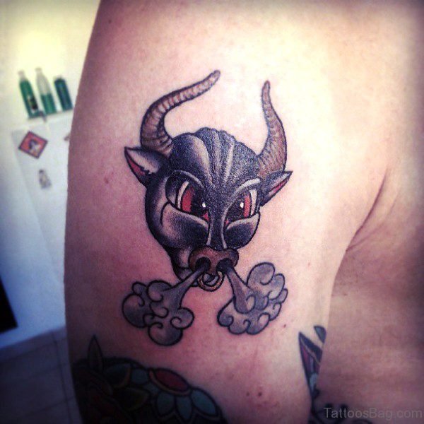 Nice Tiny Bull Tattoo On Shoulder