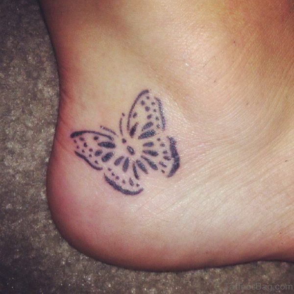 Nice Tiny Butterfly Tattoo On Ankle