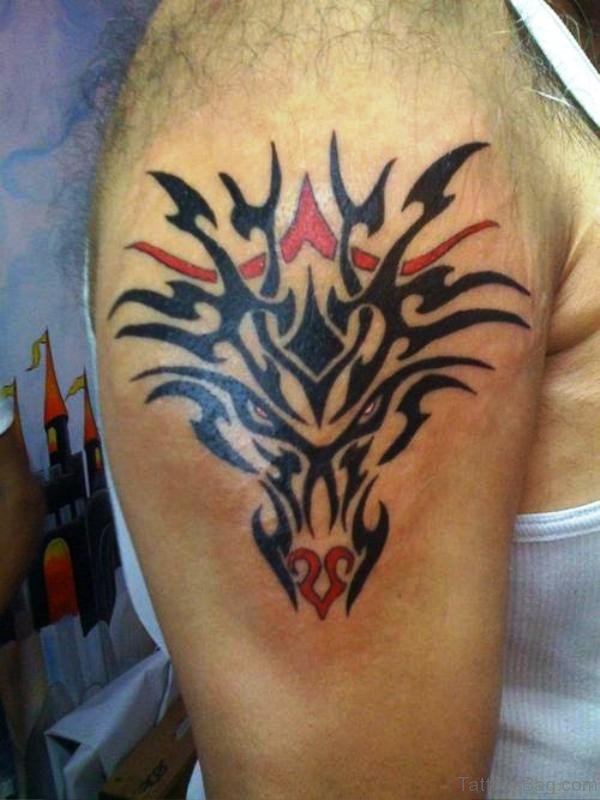 Nice Tribal Bull Tattoo On Shoulder