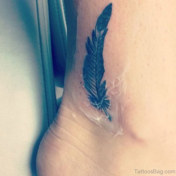 Nice feather Tattoo Design On Ankle