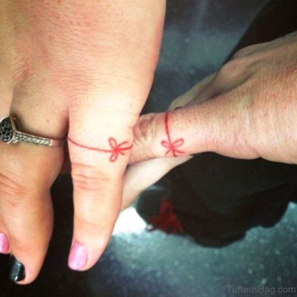 Nice red Bow Tattoo OnLittle Finger