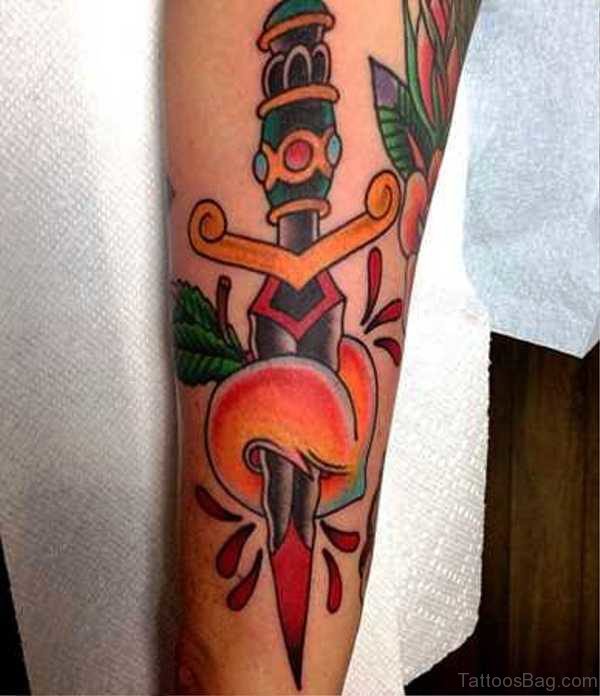 Outstanding Dagger Tattoo On Arm