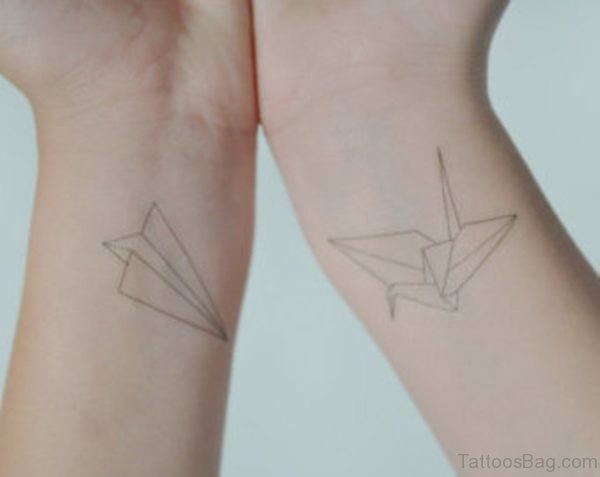 Paper Plane Wrist Tattoo