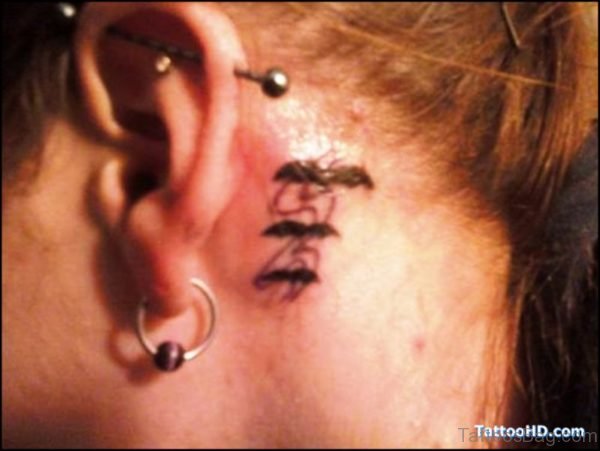 Photo Of Bats Tattoo Behind Ears