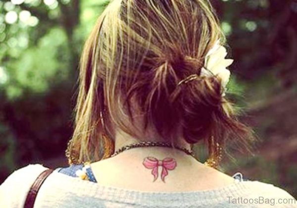 Pink Bow Tattoo On Neck