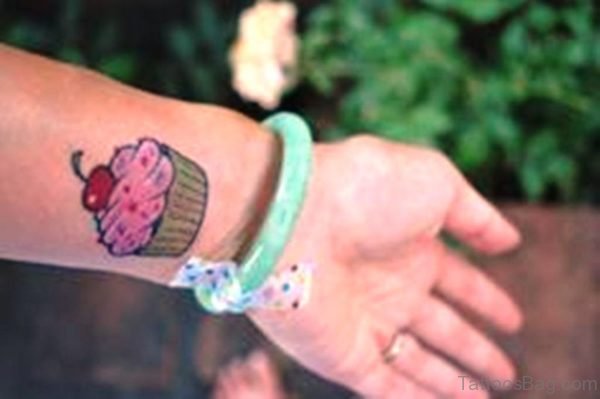Pink Cupcake Tattoo On Wrist