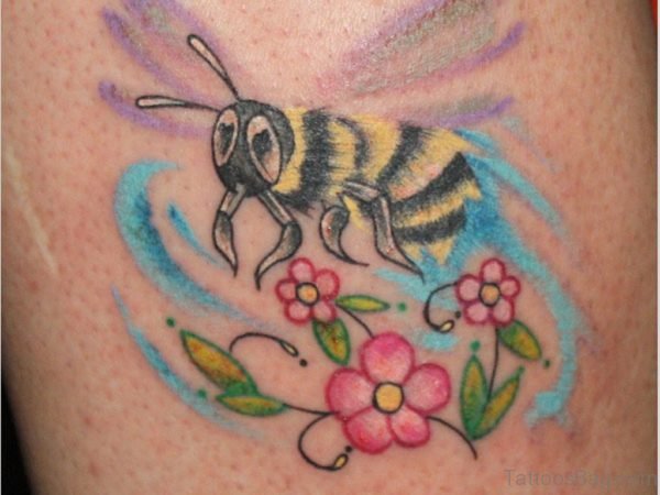 Pink Flowers And Bee Tattoo