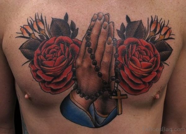 Praying Hands And Rose Tattoo On Chest