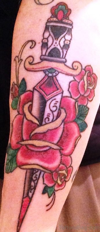 Pretty Dagger Tattoo On Arm