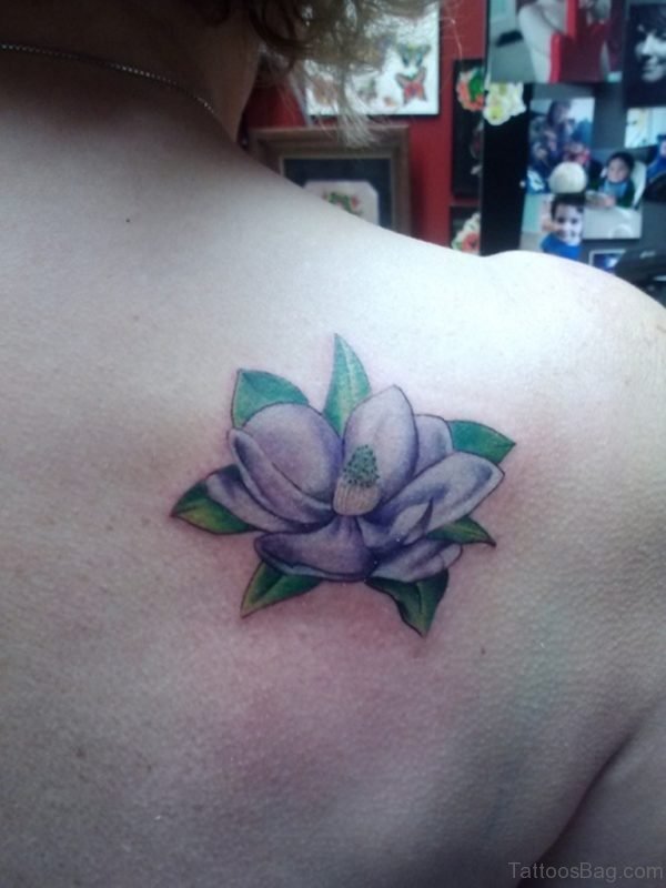 Purple Magnolia Flower Tattoo On Back