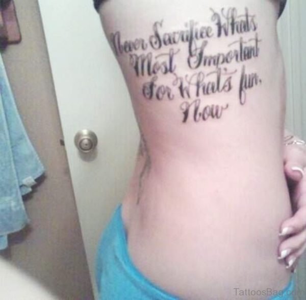 Quote Word Tattoo On Side Rib 
