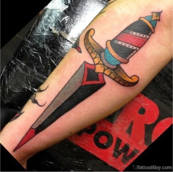 Realistic Dagger Tattoo On Arm