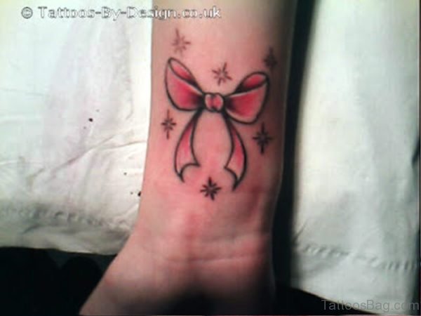 Red Bow With Stars Tattoos Design