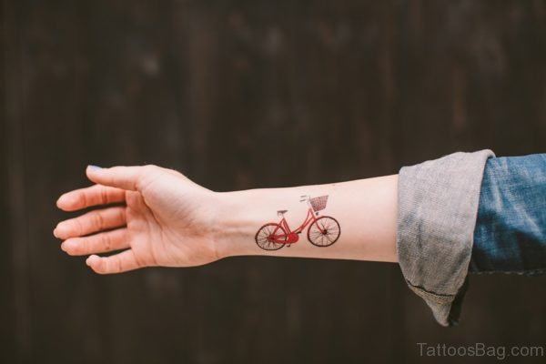 Red Cycle Tattoo On Wrist