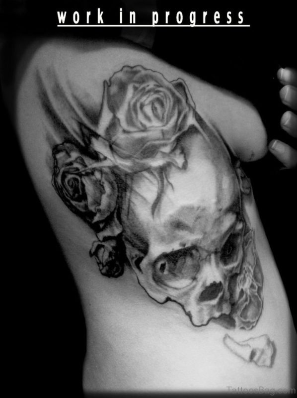Red Rose And Skull Tattoo On Rib Image