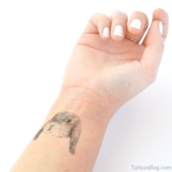 Right Wrist Rabblt Tattoo