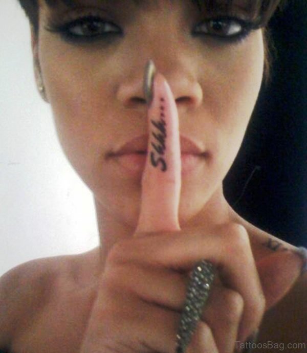 Rihanna With Shhh Finger Tattoo