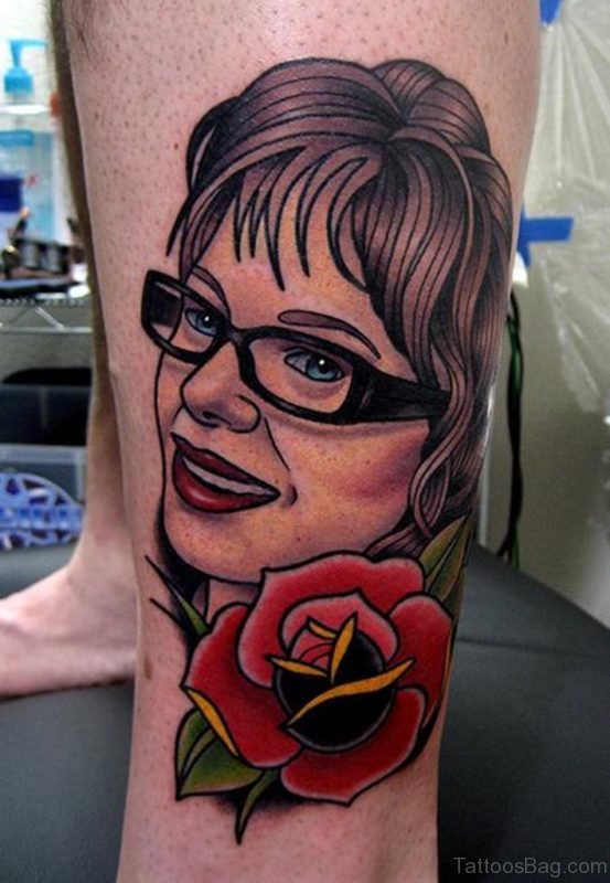 Rose And Portrait Tattoo On Leg
