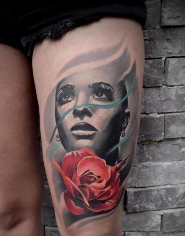 Rose And Portrait Tattoo On Thigh