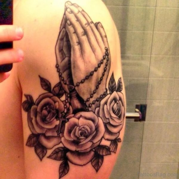 Rose Flowers And Praying Hands Tattoo