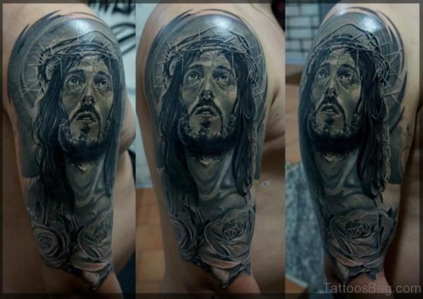 Sad Jesus Tattoo On Right Shoulder