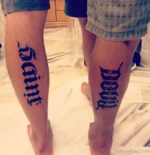 Saint Angel Ambigram Tattoo On Back Legs