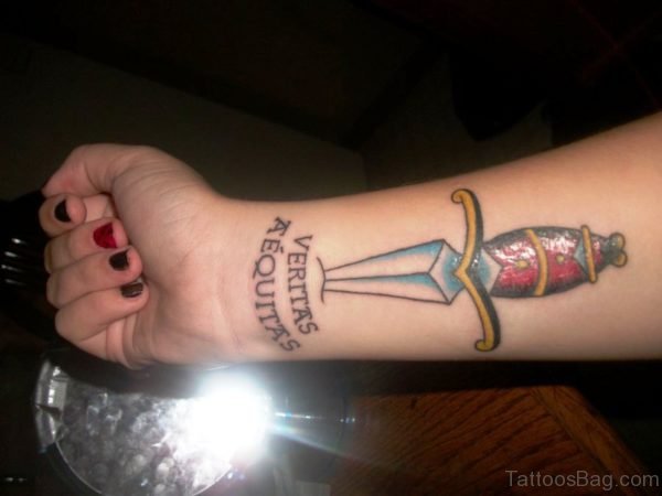 Shining Dagger Tattoo On Arm
