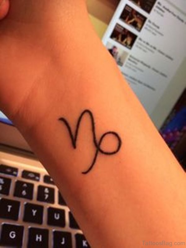 Simple Capricorn Tattoo On Wrist