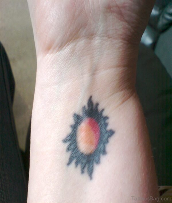 Simple Sun Moon Tattoo On Wrist 